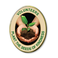 Volunteers Plant The Seeds Of Kindness Pins